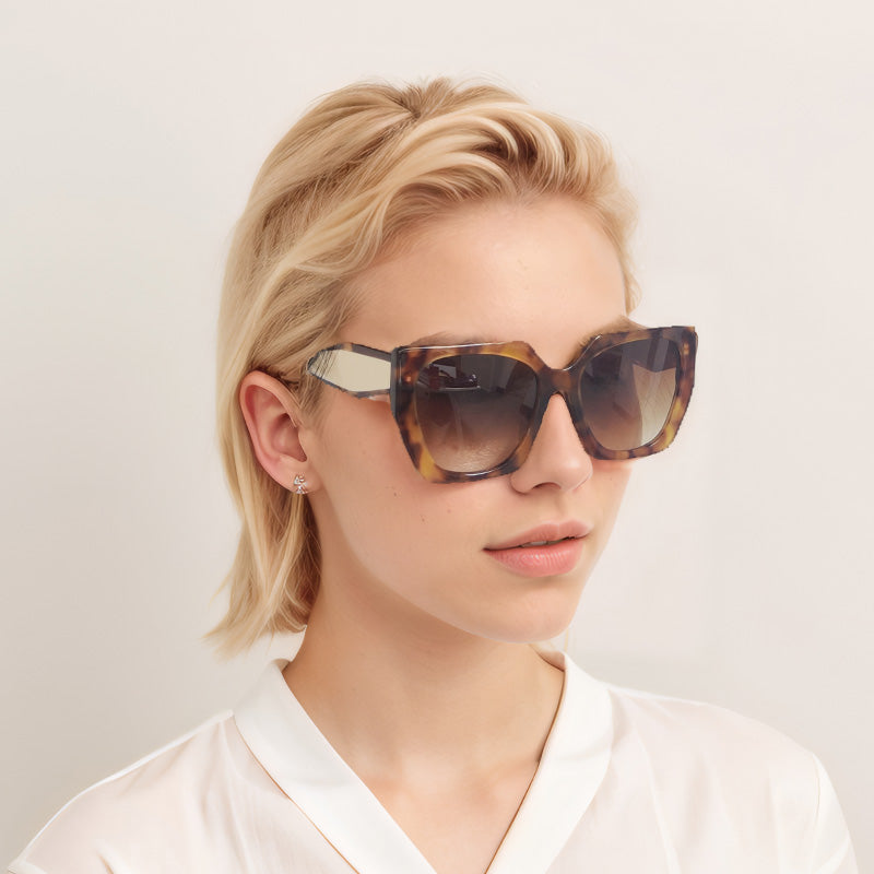 Woman wearing Lenoir Brest tortoiseshell sunglasses