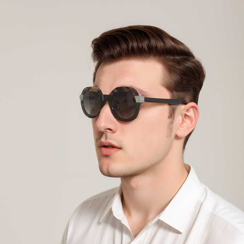 Man wearing round Lenoir sunglasses